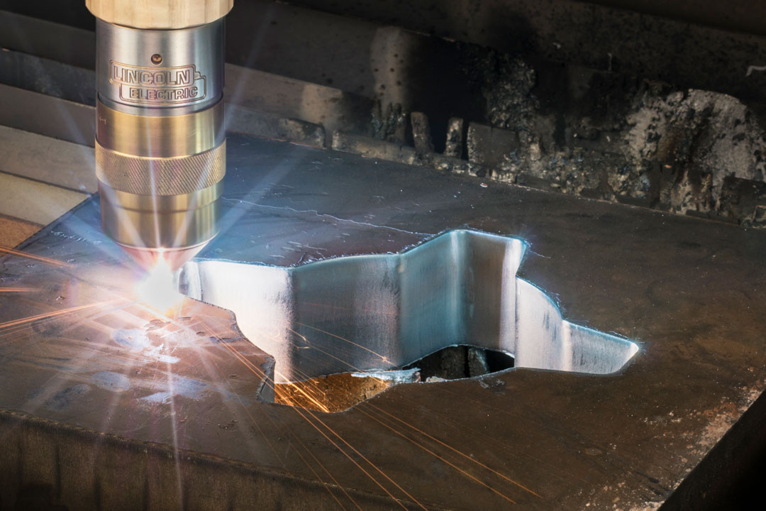 A plasma cutter cutting a component for large tooling or flight hardware for the aerospace, defense, and space industry
