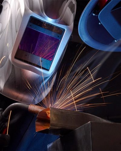 A fabricator welding a tooling/flight hardware part for the aerospace, defense, and space industry
