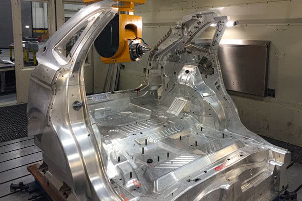 Aluminum automotive tooling (vehicle buck) being CNC-machined