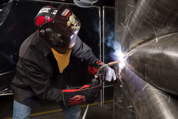 A fabricator welds an offshore platform joint for the oil and gas industry