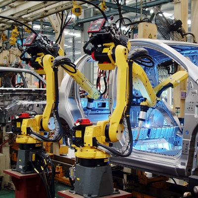Robotic welders on an automotive assembly line